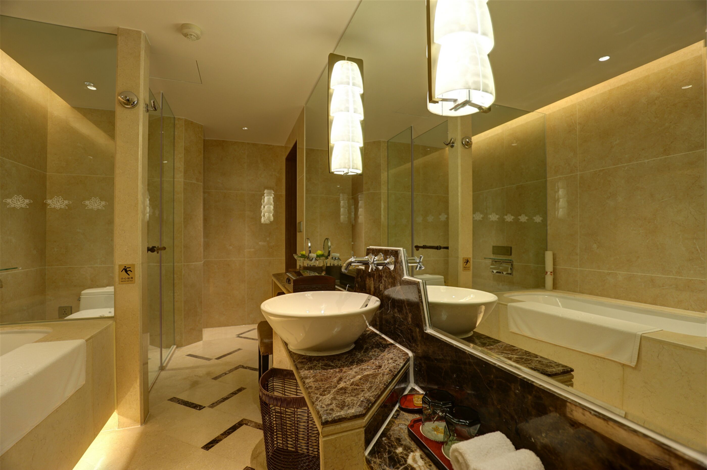separate bathtub and shower, rainfall showerhead, designer toiletries