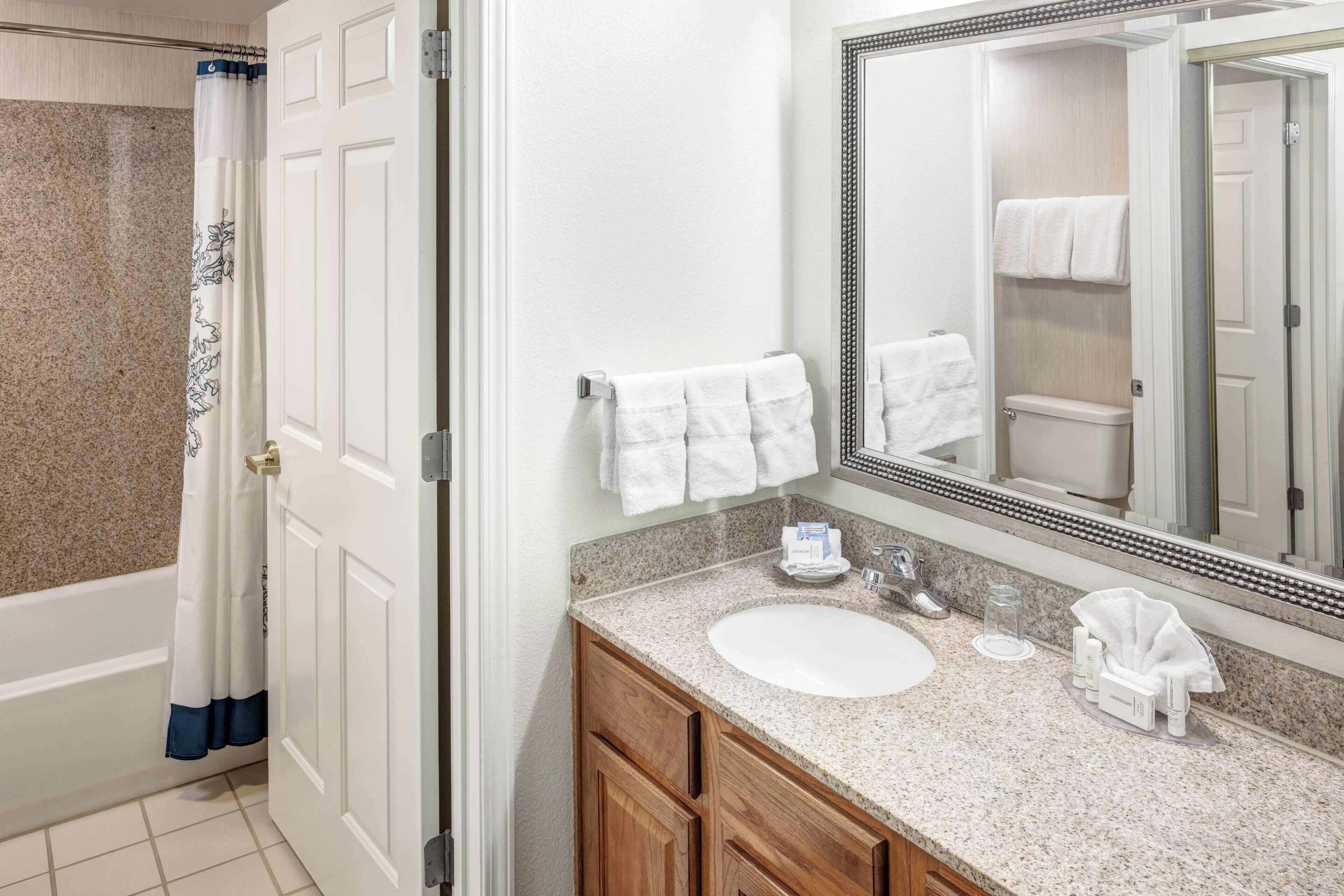 suite, 1 bedroom, non smoking | bathroom | combined shower/bathtub, free toiletries, hair dryer, towels