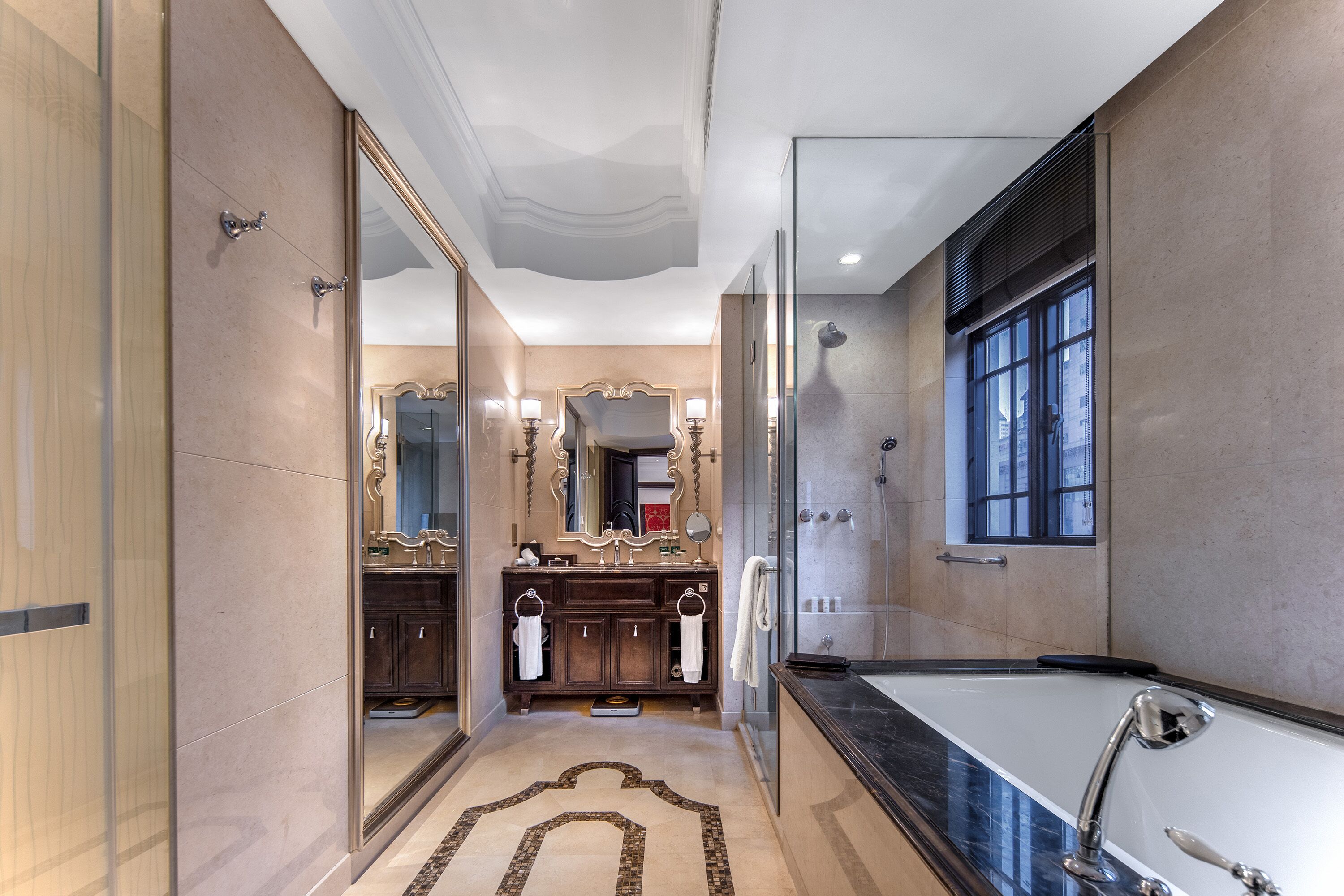 designer toiletries, hair dryer, bathrobes, slippers