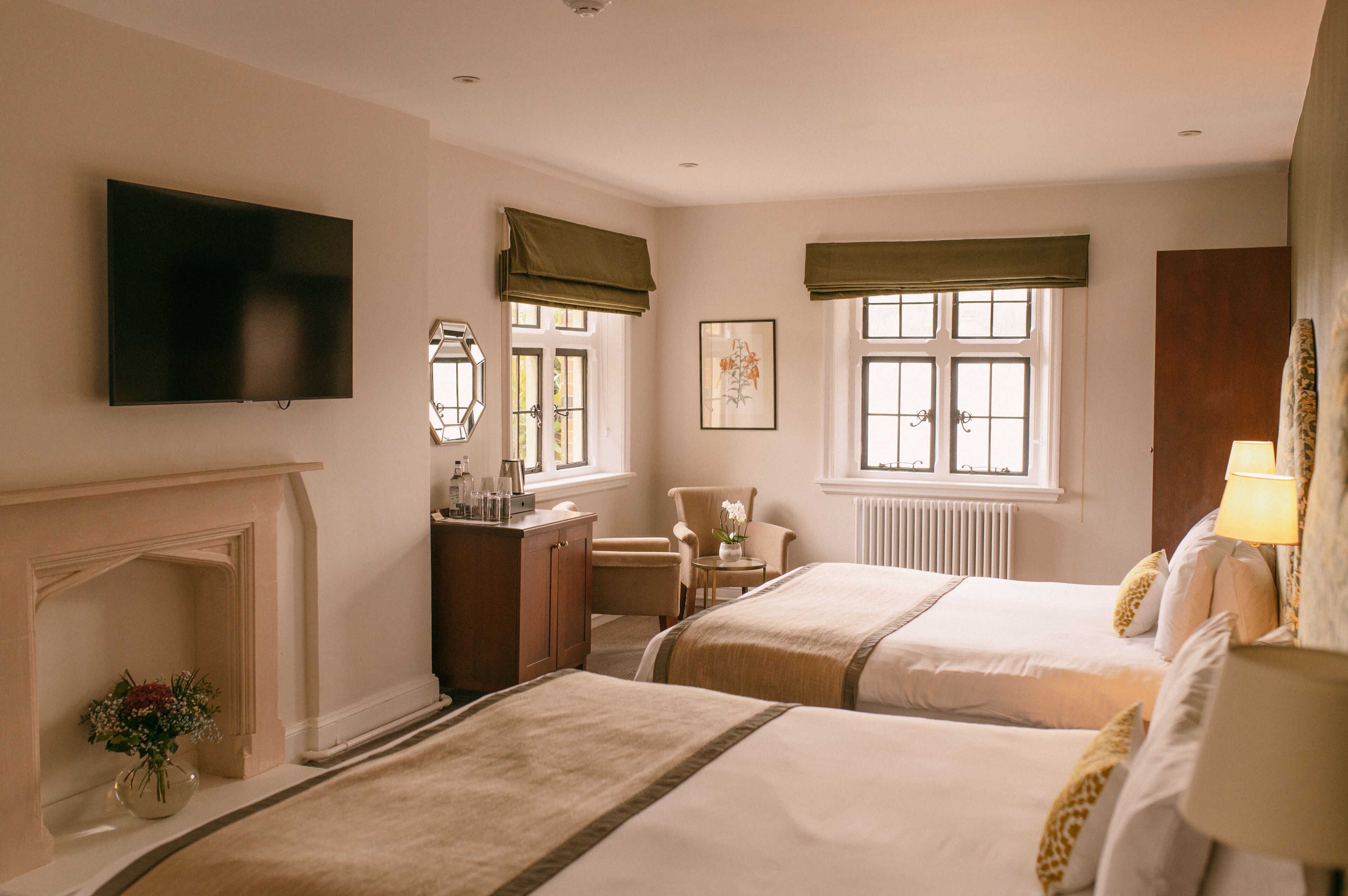 deluxe family room | 1 bedroom, individually decorated, individually furnished, desk