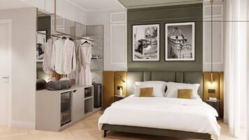 Une chambre à coucher moderne avec un lit, un dressing et deux tableaux encadrés accrochés au mur.