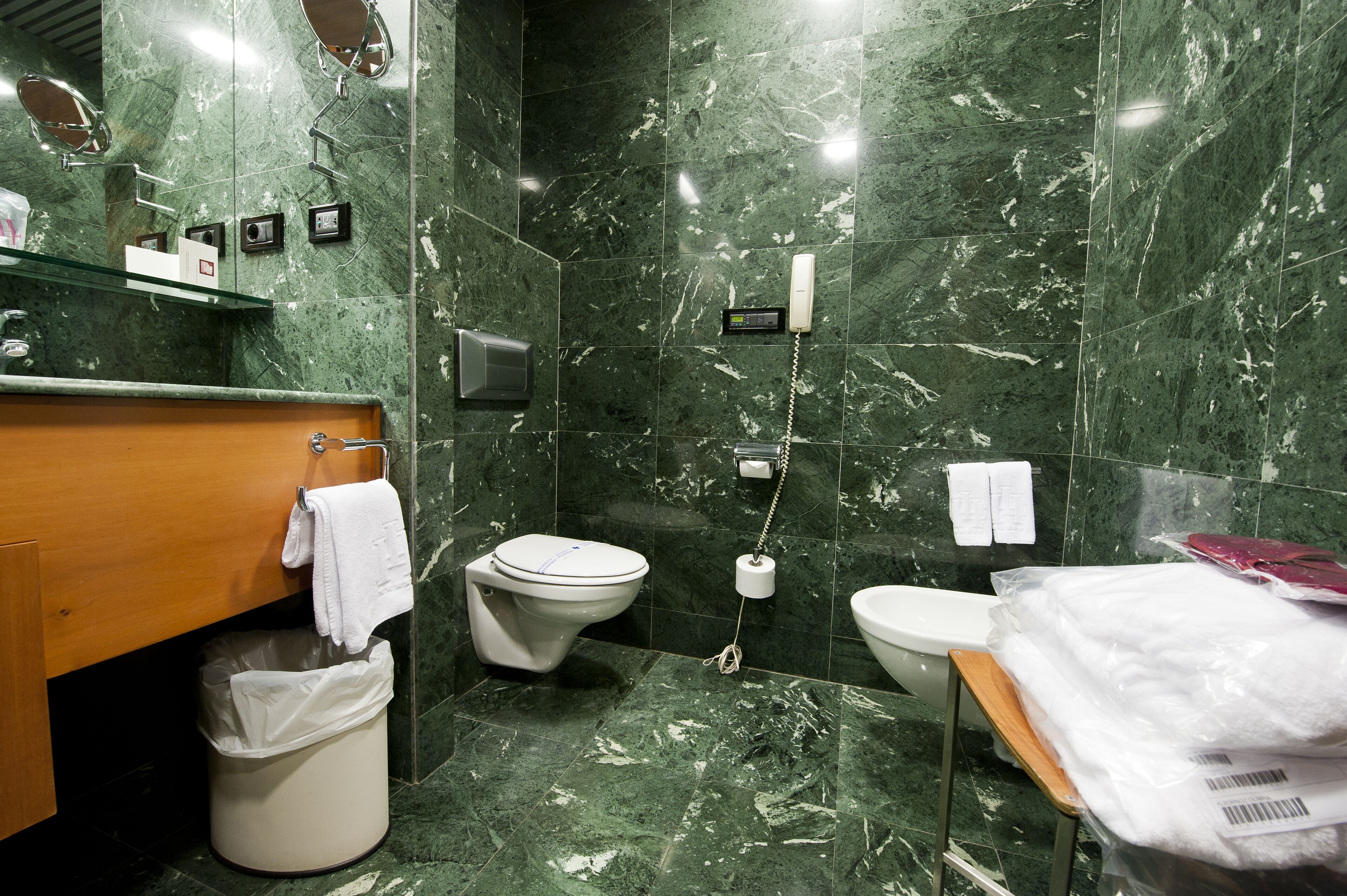 superior double room | bathroom | bathtub, hair dryer, bidet, towels
