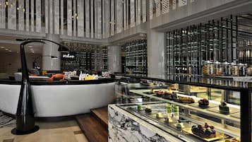 4 restaurants, breakfast, lunch, dinner served; international cuisine