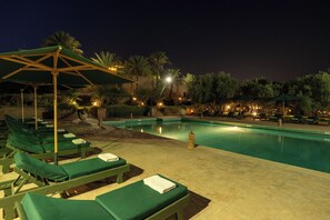 Outdoor pool, open 8:00 AM to 7:00 PM, pool umbrellas, sun loungers