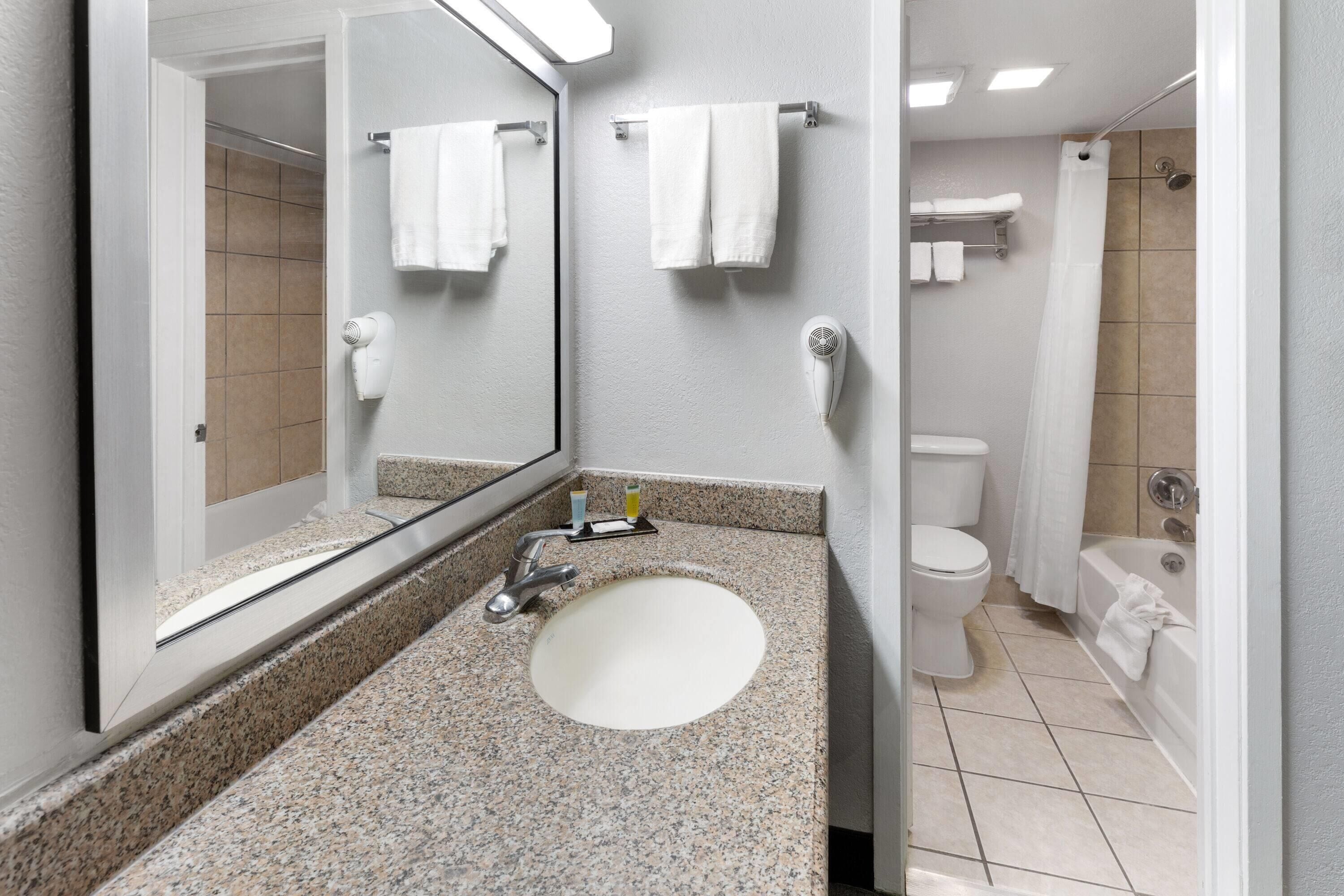 Bathtub, deep-soaking bathtub, free toiletries, hair dryer