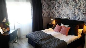 Camas com colchões pillow-top, ferros/tábuas de passar roupa