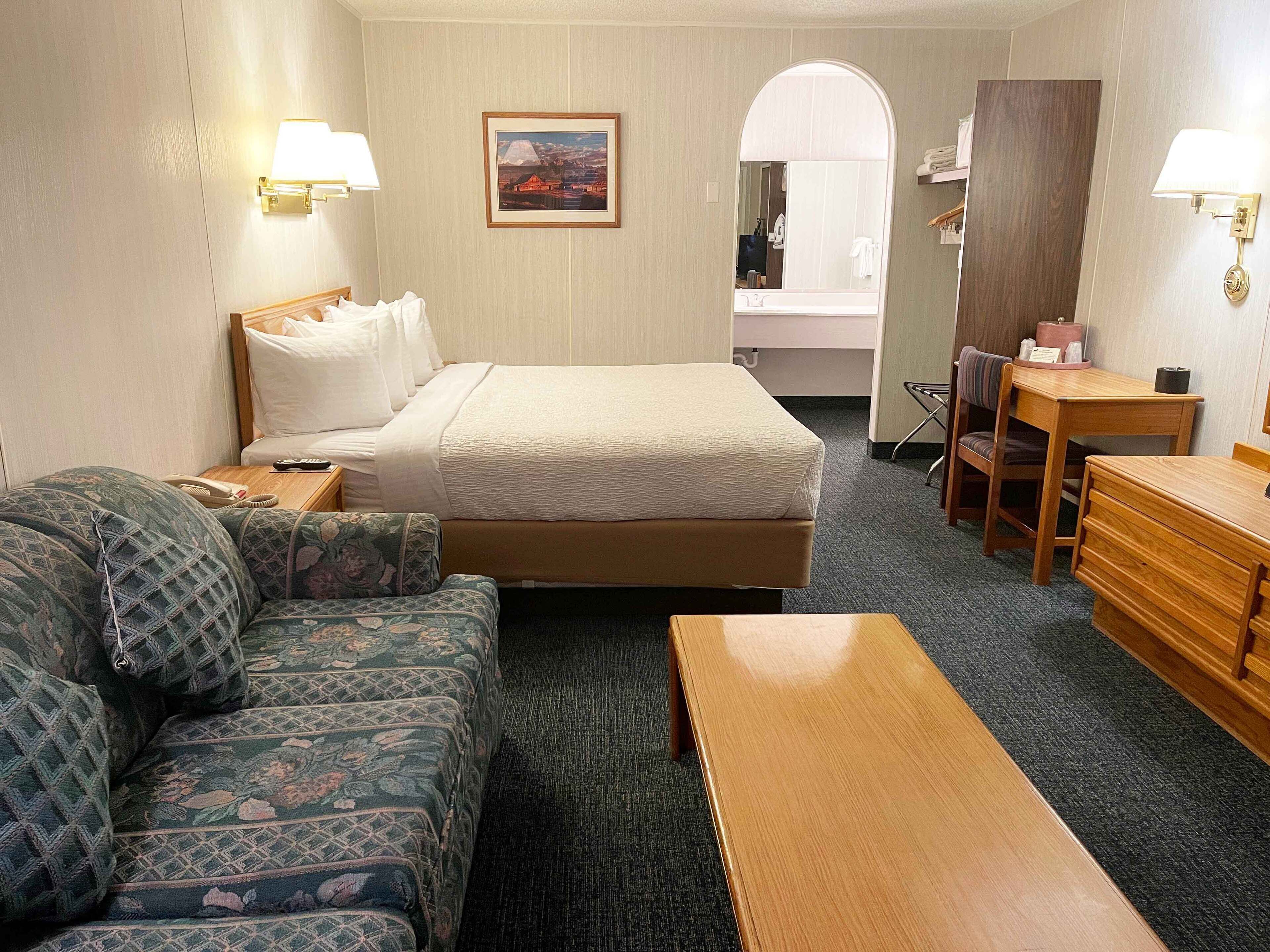 deluxe room, 1 king bed | laptop workspace, iron/ironing board, travel cot, free wifi