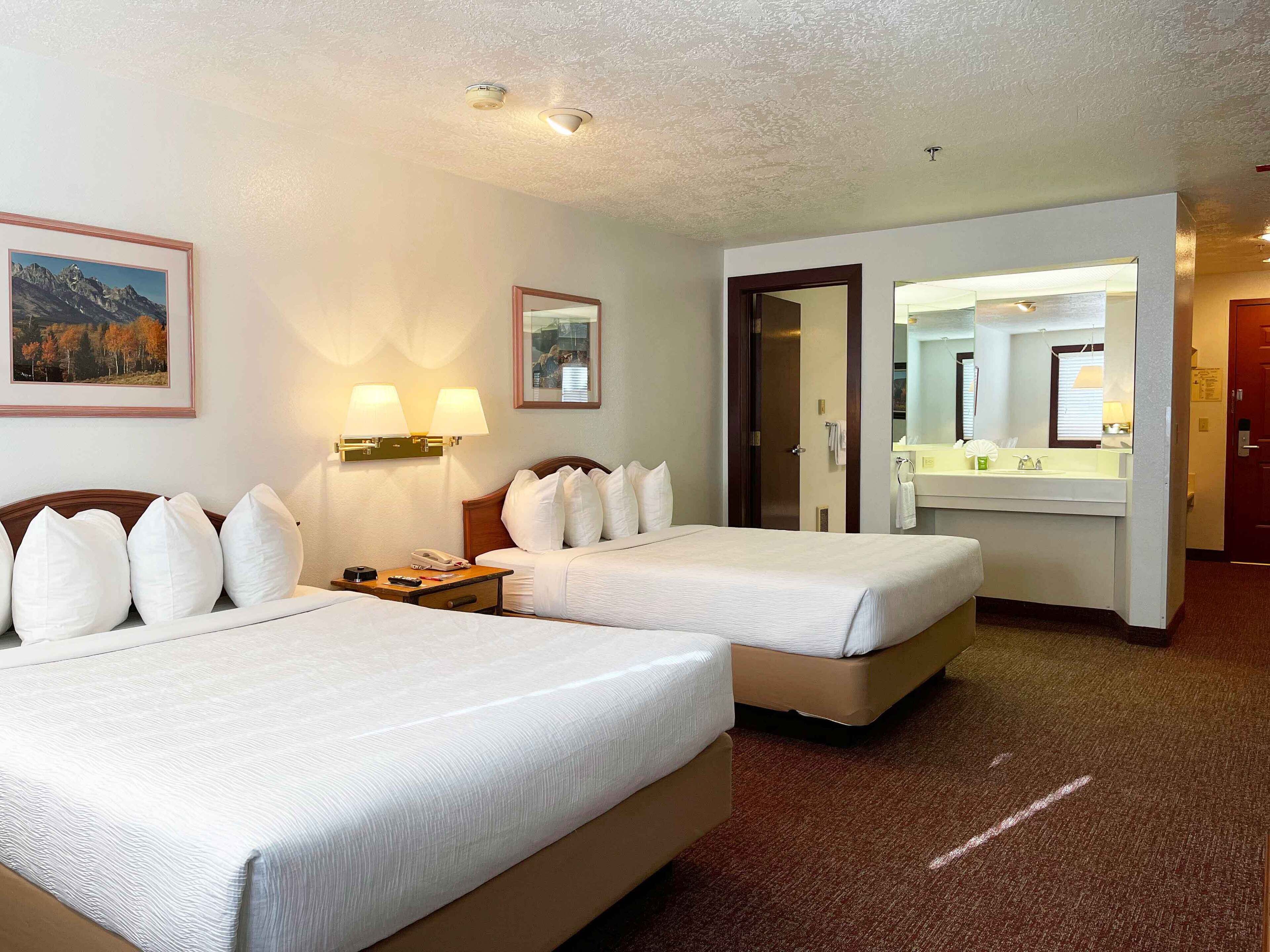 superior, two queen beds | laptop workspace, iron/ironing board, travel cot, free wifi