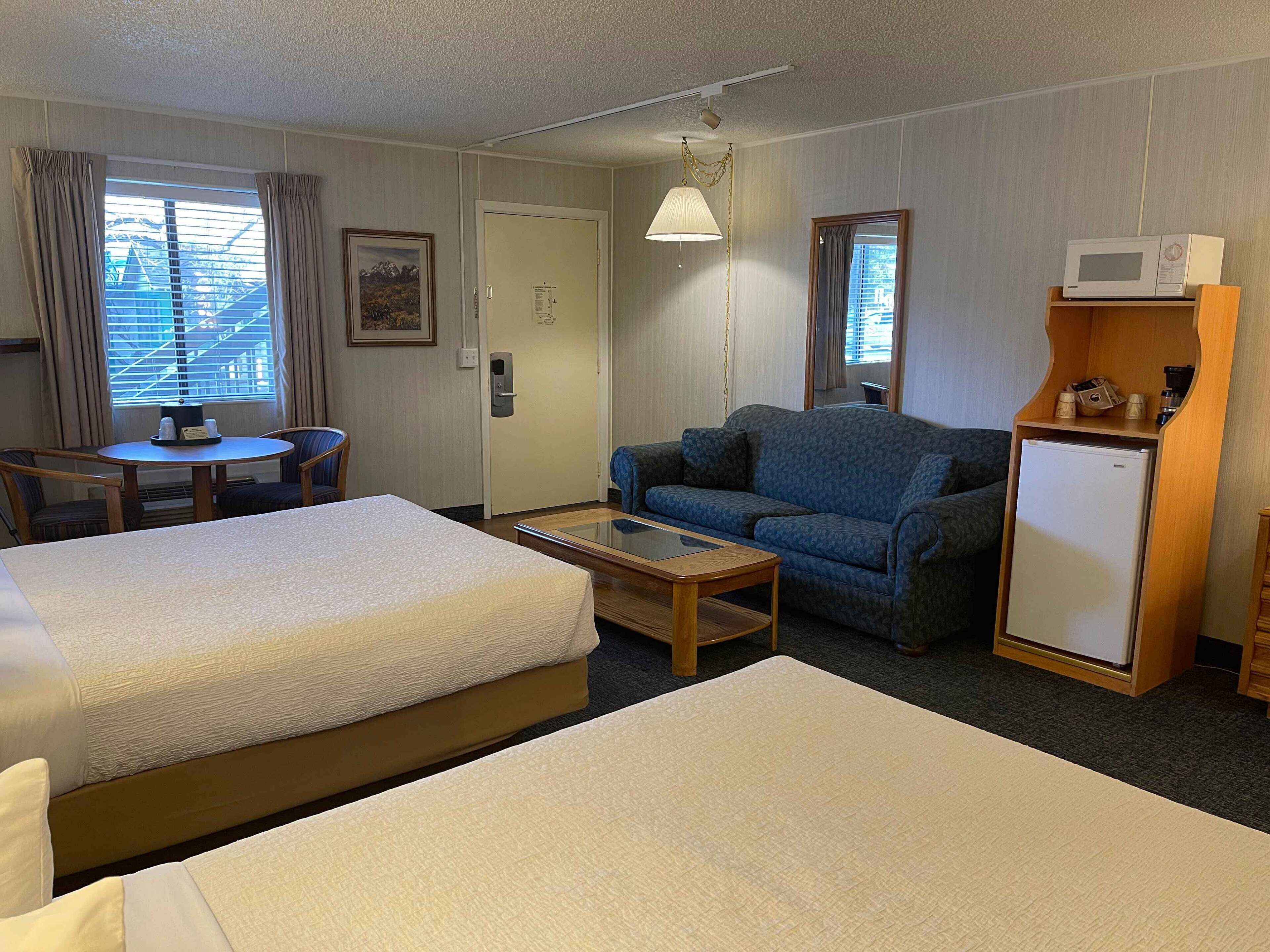 deluxe room, 2 queen beds | laptop workspace, iron/ironing board, travel cot, free wifi