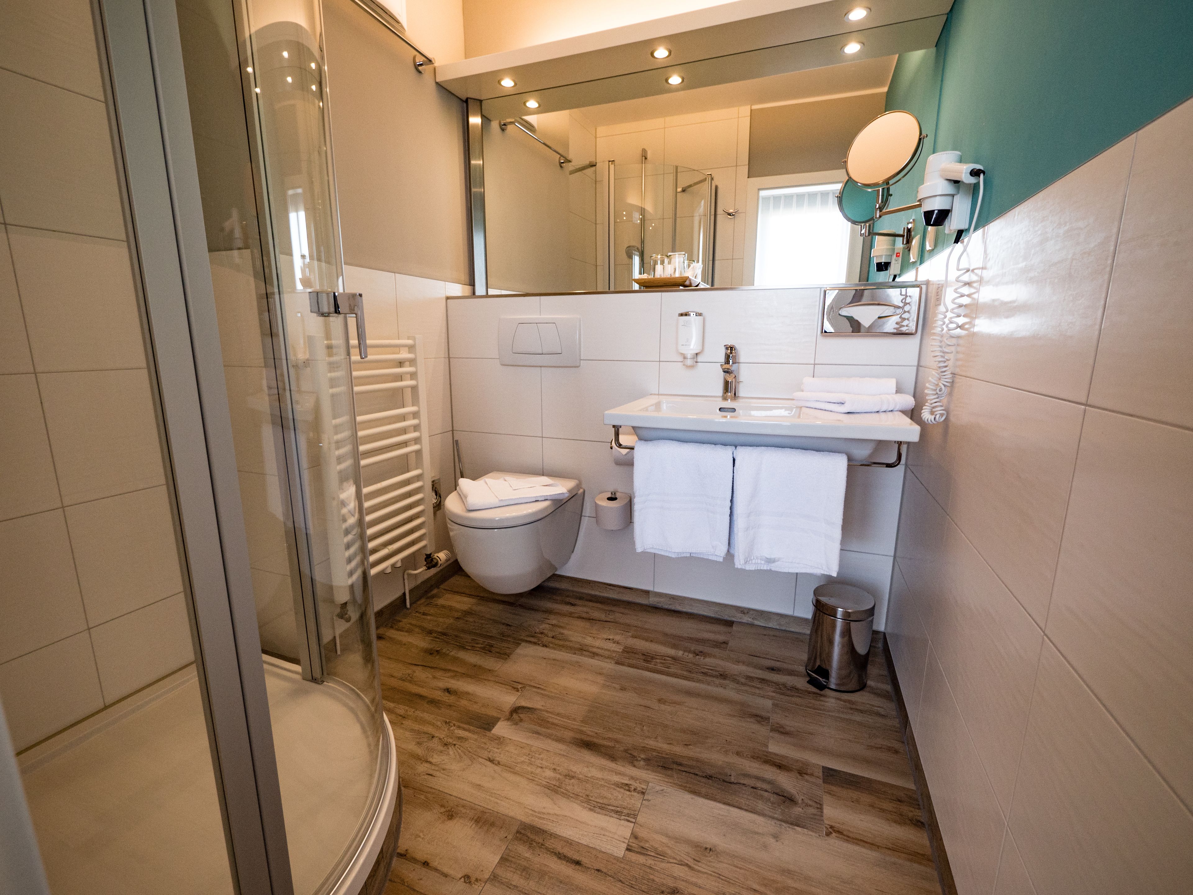 shower, free toiletries, hair dryer, bathrobes