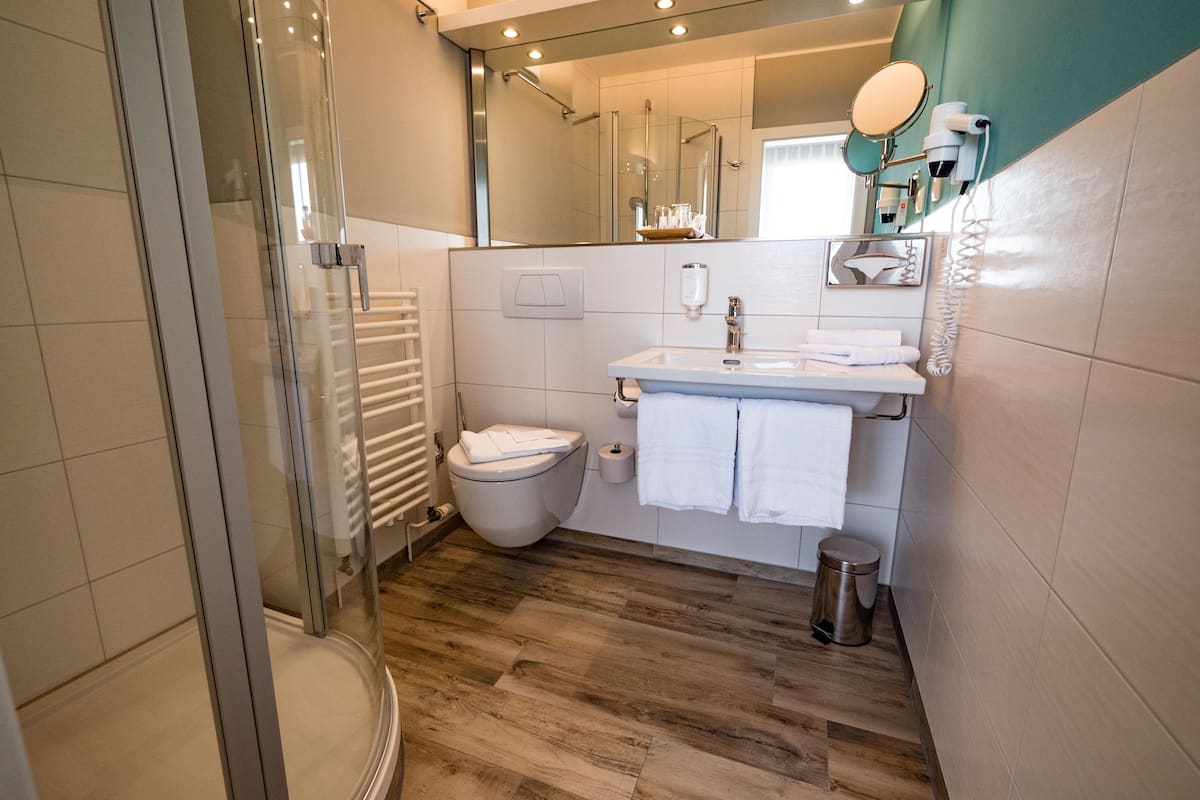 shower, free toiletries, hair dryer, bathrobes