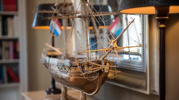 A model ship on a shelf.