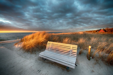 Beach nearby, sun loungers, beach umbrellas. Hotel Godewind