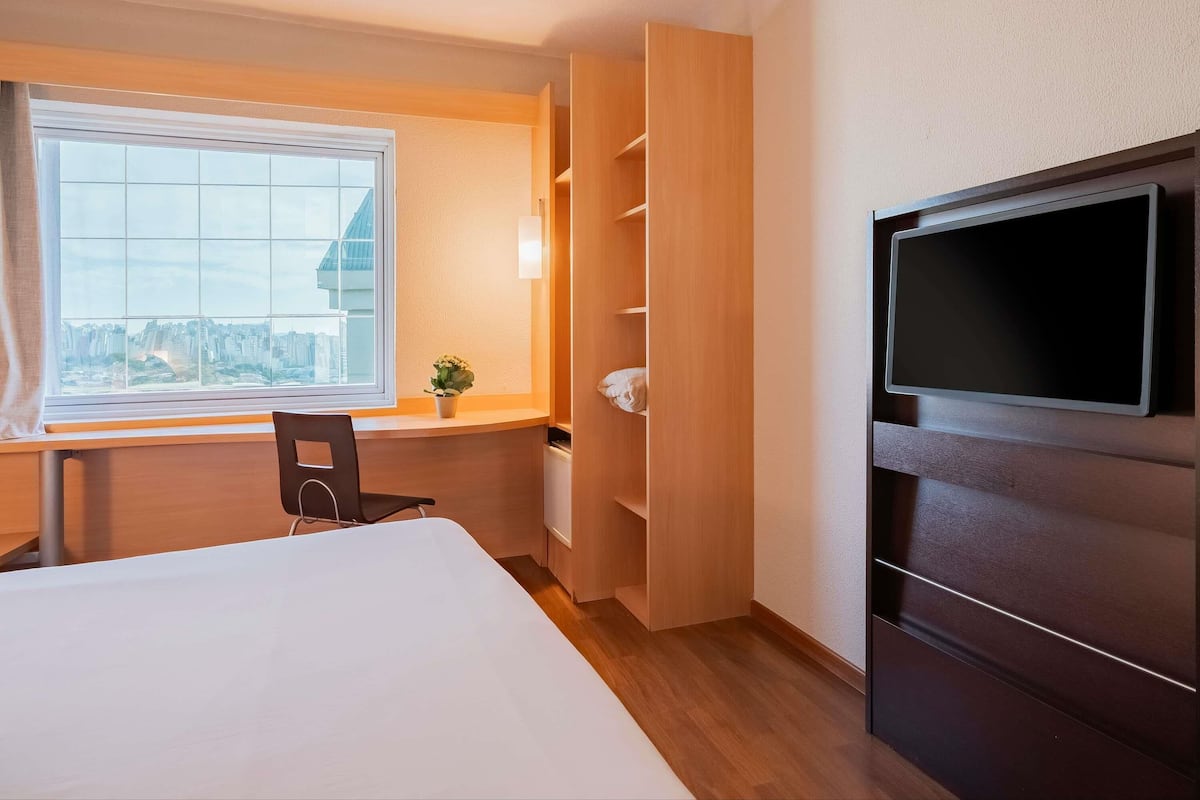 Minibar, bureau, rideaux occultants, chambres insonorisées