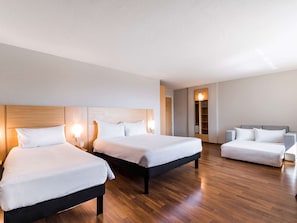 Family Room, Multiple Beds | Minibar, desk, blackout drapes, soundproofing