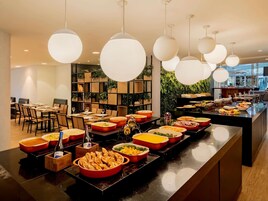 Breakfast, lunch, dinner served; local and international cuisine 