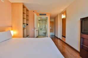 Minibar, desk, blackout drapes, soundproofing