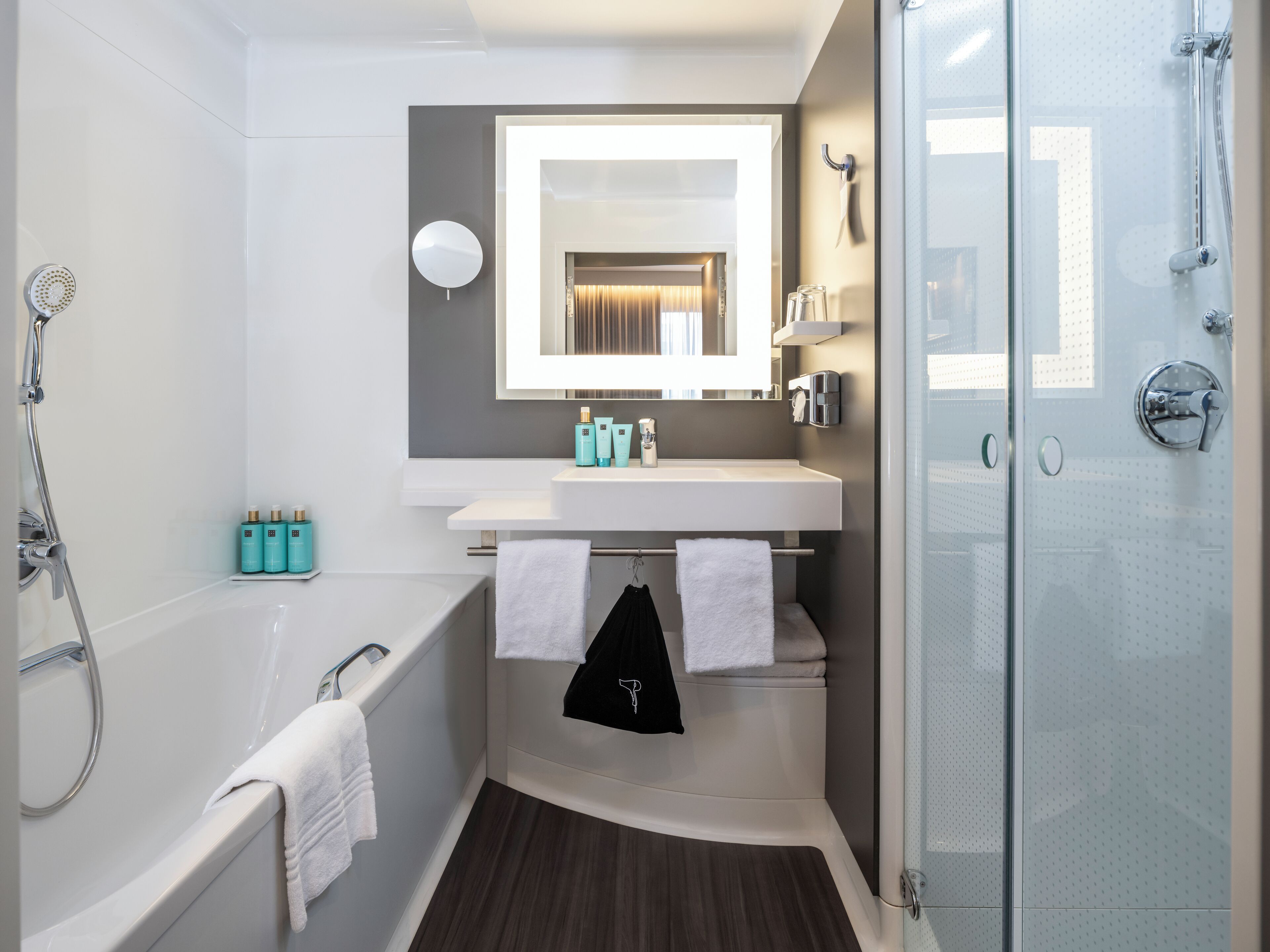 separate bathtub and shower, eco-friendly toiletries, hair dryer, towels
