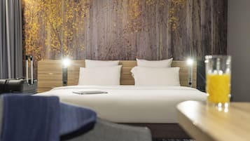 Standard-Suite, 1 King-Bett und Schlafsofa (Junior) | Hochwertige Bettwaren, Zimmersafe, Schreibtisch, schallisolierte Zimmer