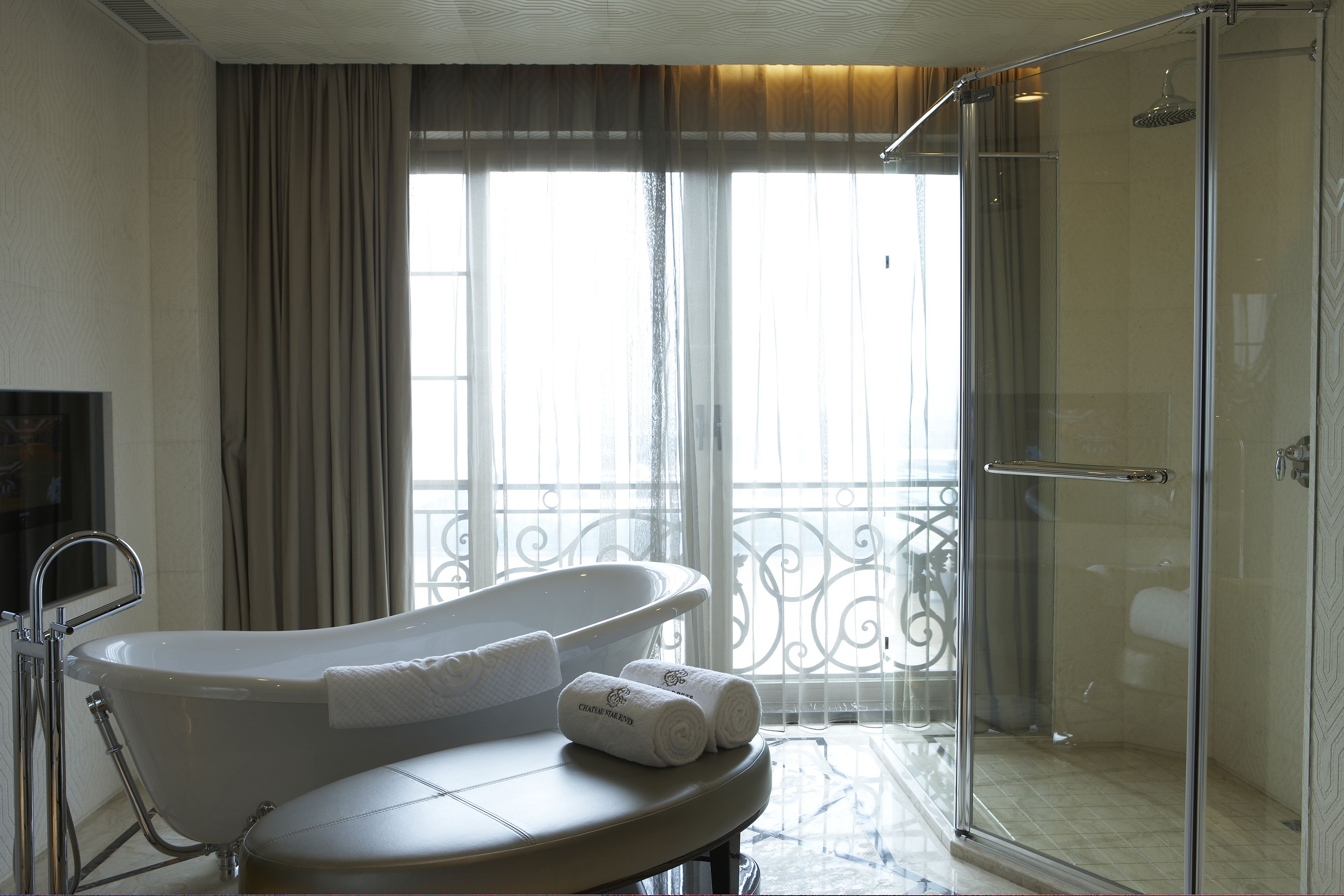 spa suite | bathroom | separate bathtub and shower, designer toiletries, hair dryer, bathrobes