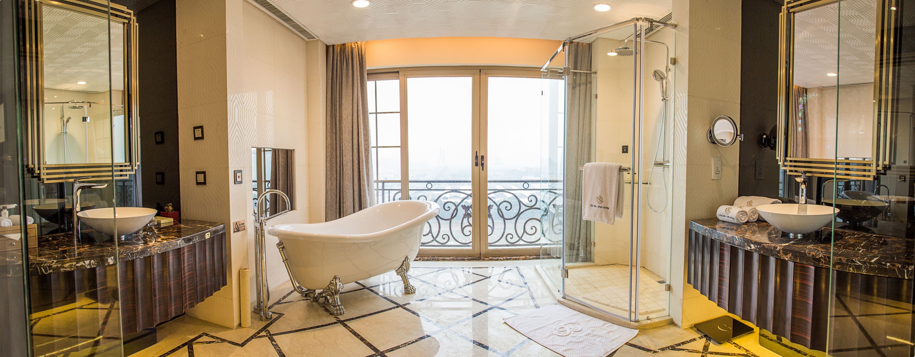 castle suite | bathroom | separate bathtub and shower, designer toiletries, hair dryer, bathrobes