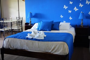 Standard Room, Balcony, Partial Ocean View | 1 bedroom, in-room safe, individually decorated, blackout drapes