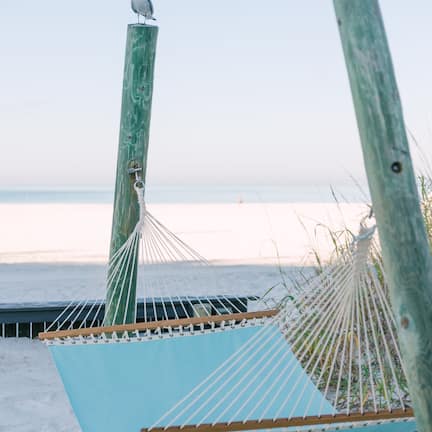 On the beach, beach cabanas, beach volleyball, 2 beach bars