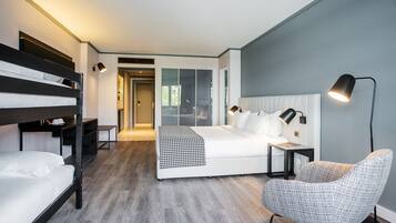 Family Room | Minibar, in-room safe, blackout curtains, soundproofing