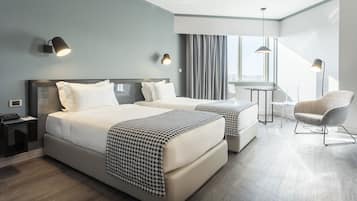 Economy Double or Twin Room | Minibar, in-room safe, free WiFi, bed sheets