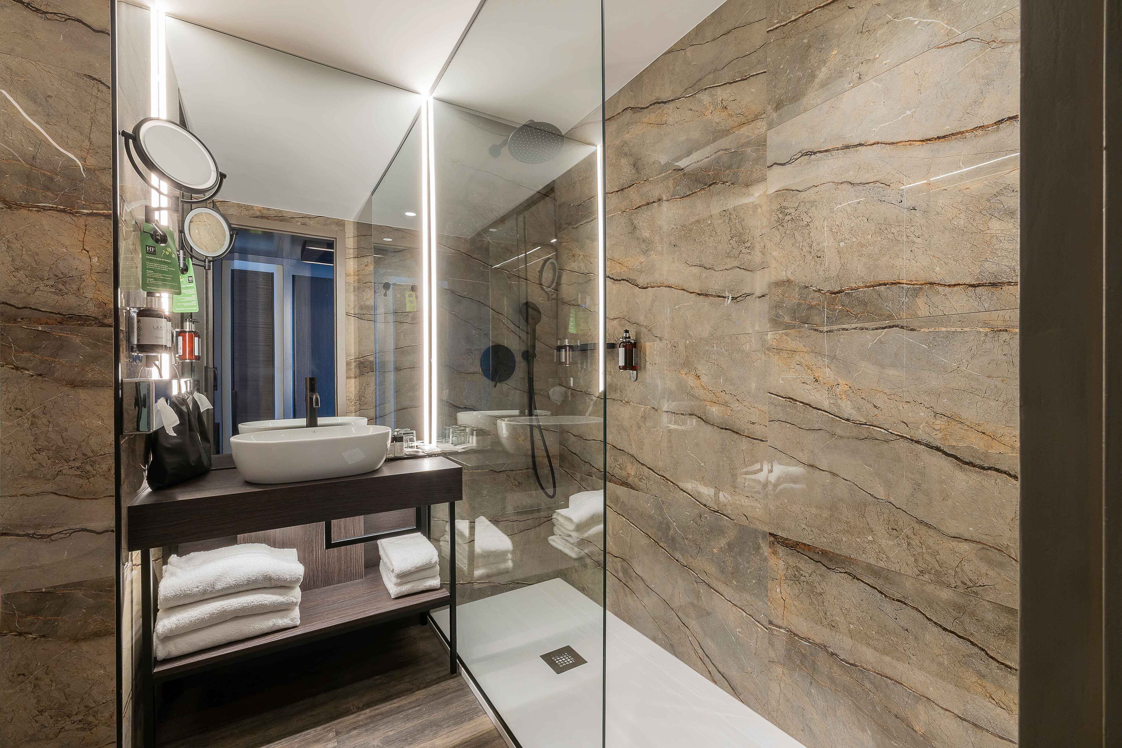 hair dryer, bidet, towels