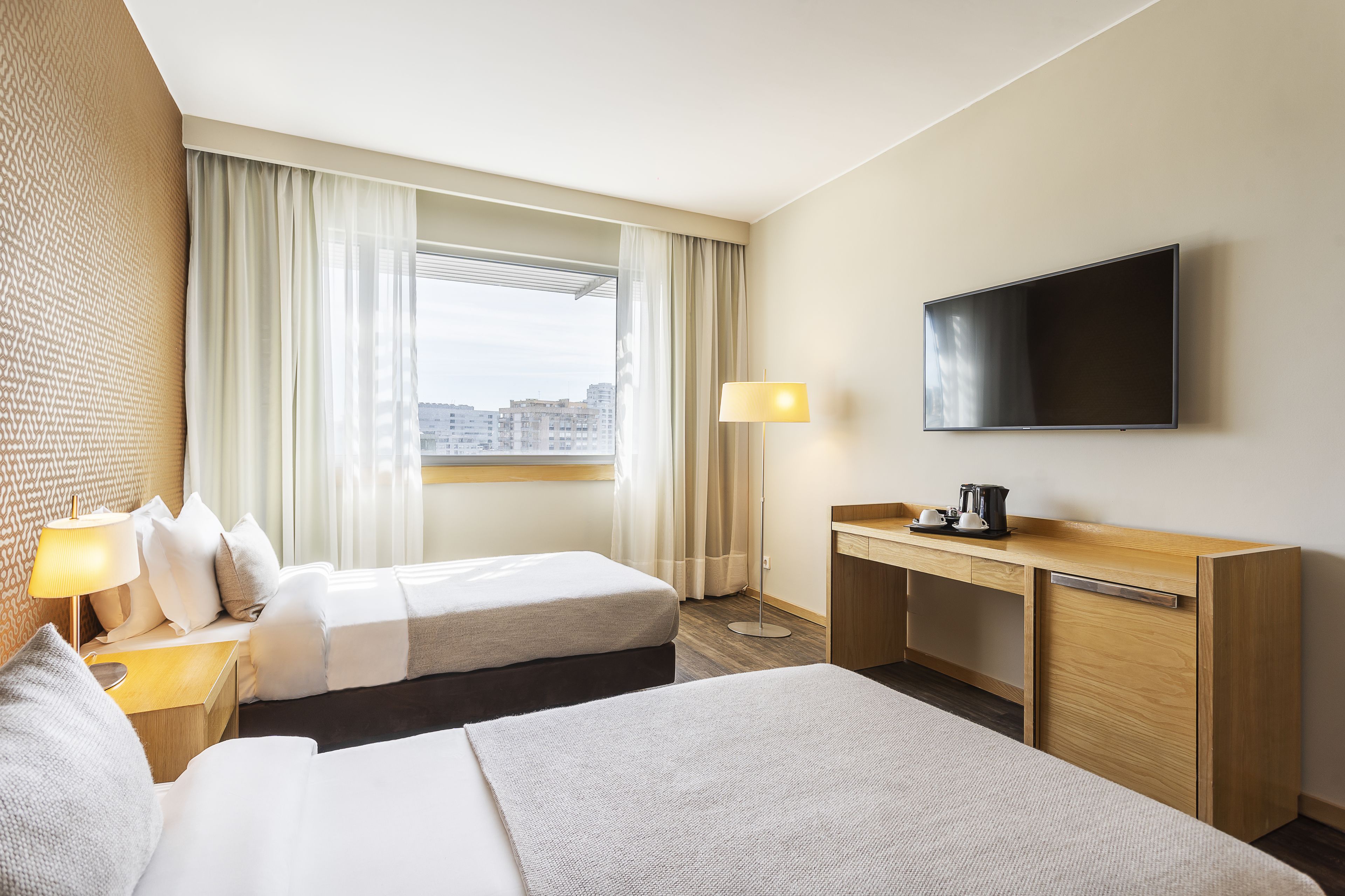 quadruple room | minibar, in-room safe, desk, blackout curtains