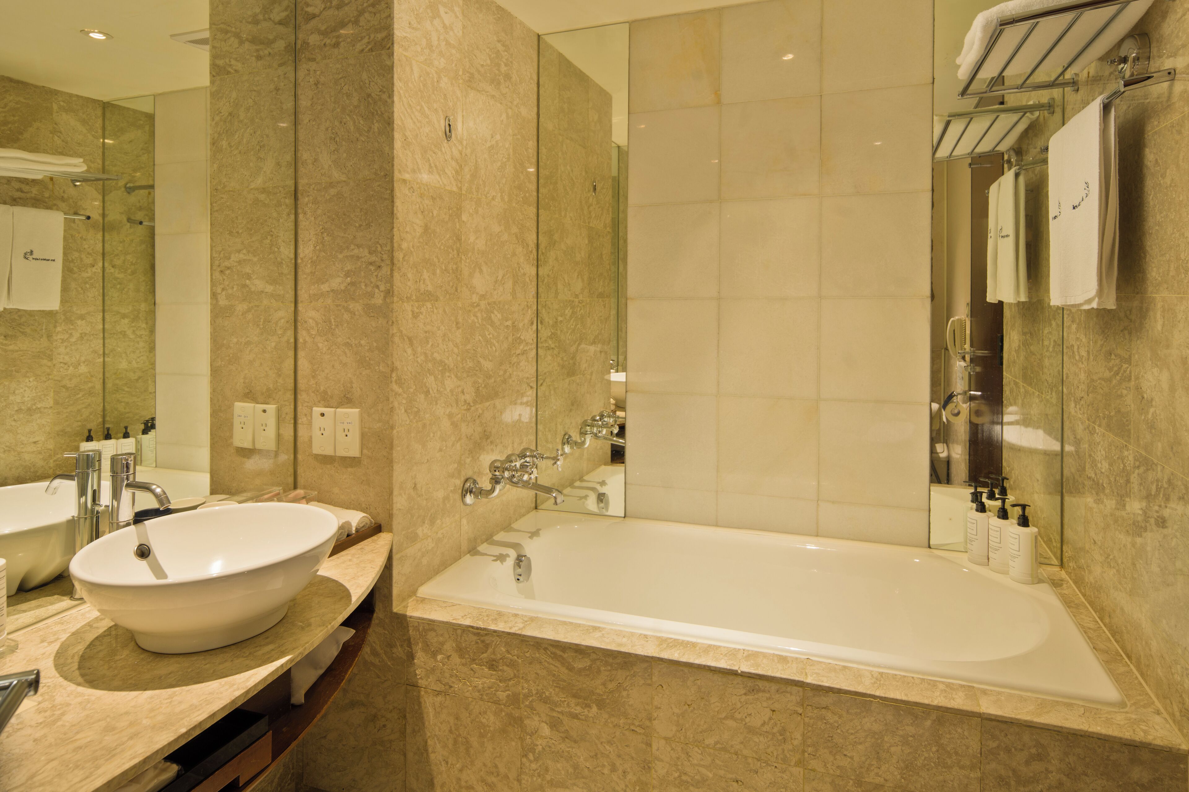 separate bathtub and shower, deep-soaking bathtub, rainfall showerhead