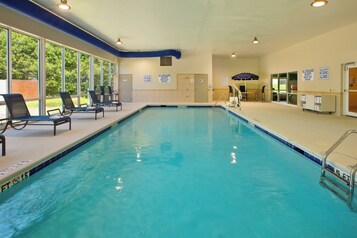 Indoor pool, open 8:00 AM to 10:00 PM, pool loungers