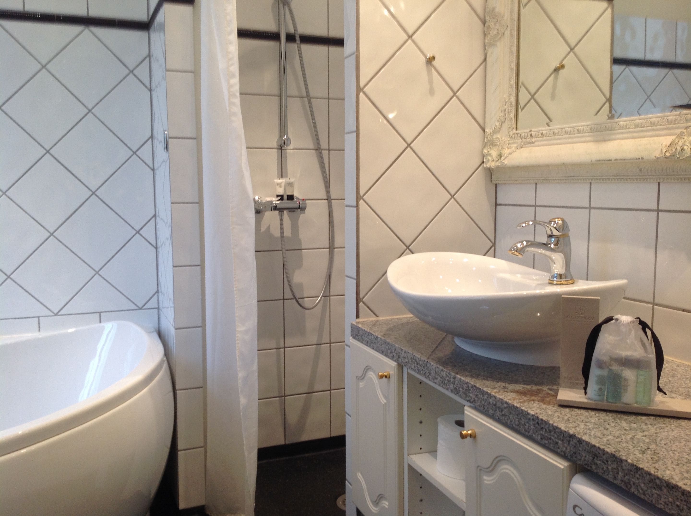 junior suite, jetted tub | bathroom | free toiletries, hair dryer, towels, soap