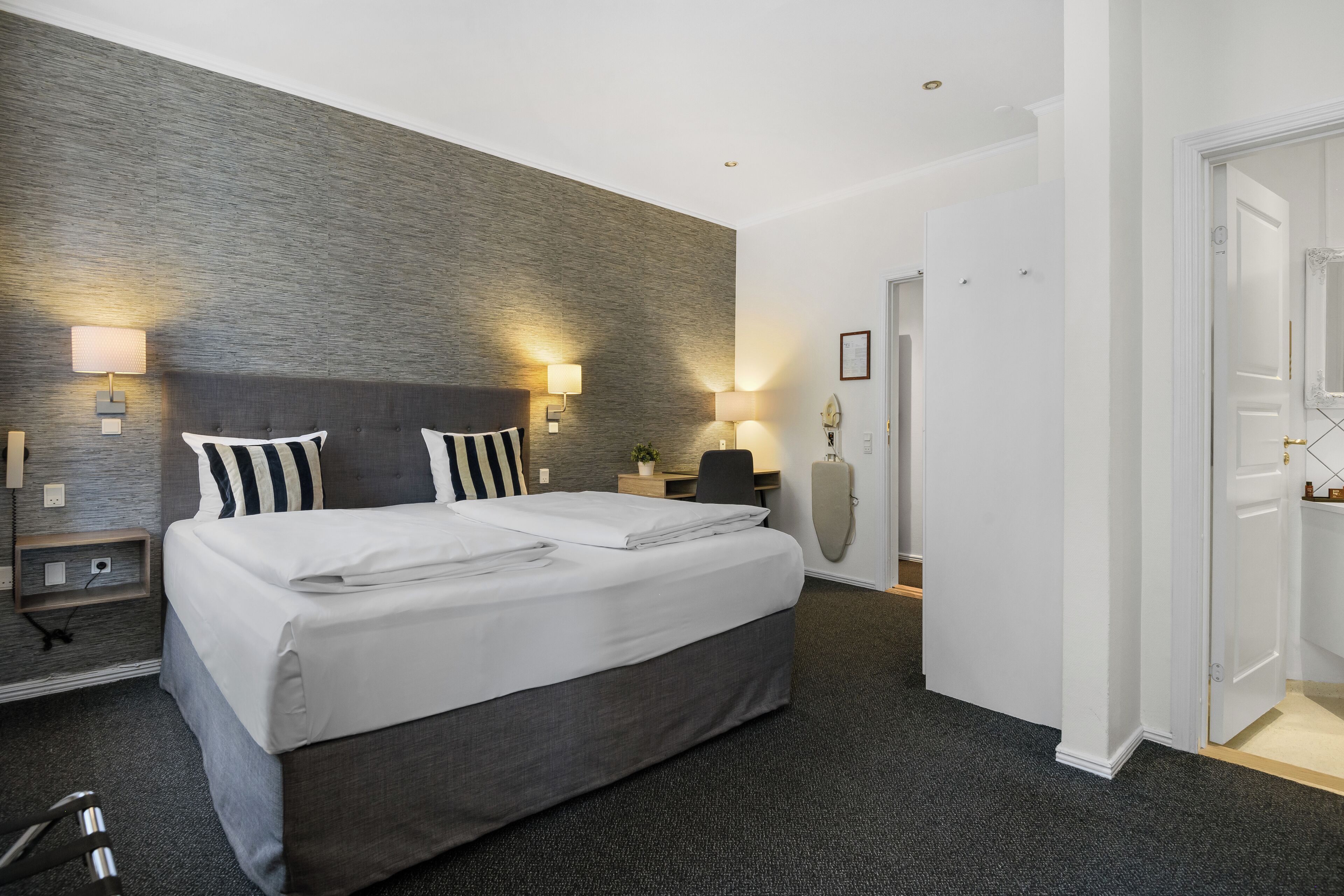 Hypo-allergenic bedding available, in-room safe, desk, laptop workspace