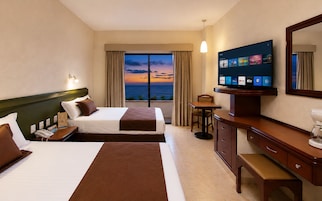 Standard Room | Premium bedding, blackout drapes, iron/ironing board, cribs/infant beds