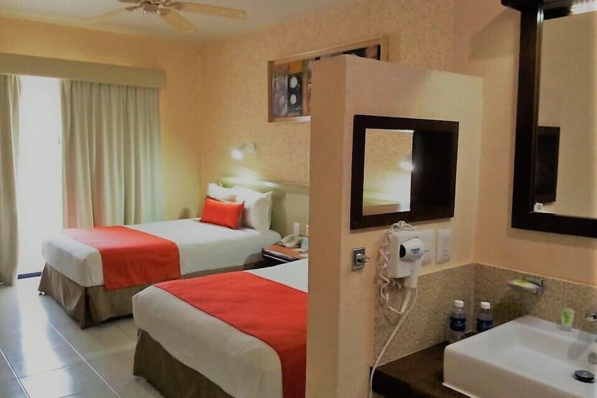 Premium bedding, blackout drapes, iron/ironing board, cribs (surcharge)
