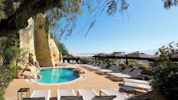 Seasonal outdoor pool, open 9:00 AM to 5:00 PM, pool loungers