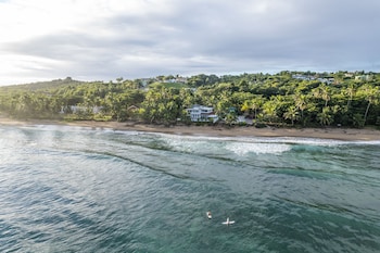 On the beach, beach towels at Casa Islena Inn
