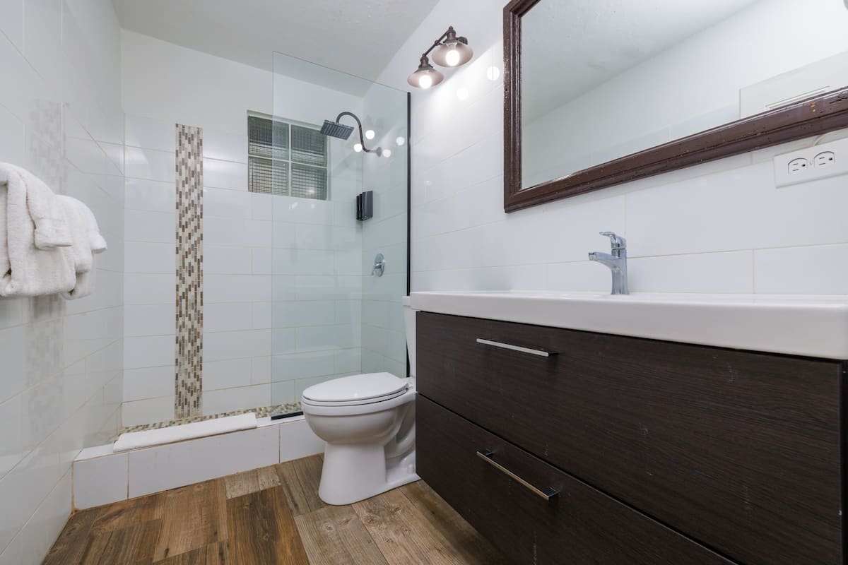 room, 2 queen beds, ocean view | bathroom | shower, free toiletries, hair dryer, towels