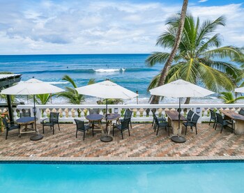 On the beach, beach towels at Casa Islena Inn