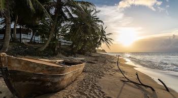 On the beach, beach towels at Casa Islena Inn