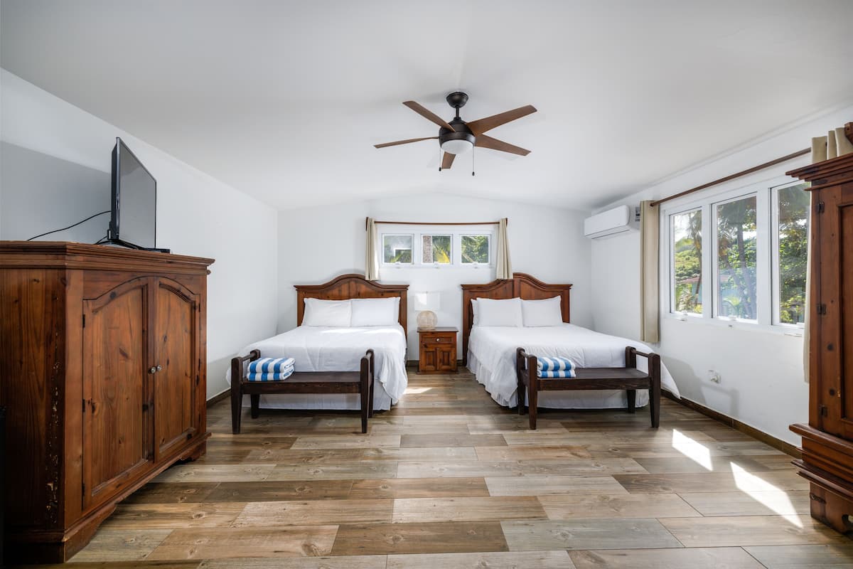 standard room, 2 queen beds | pillow-top beds, desk, laptop workspace, bed sheets