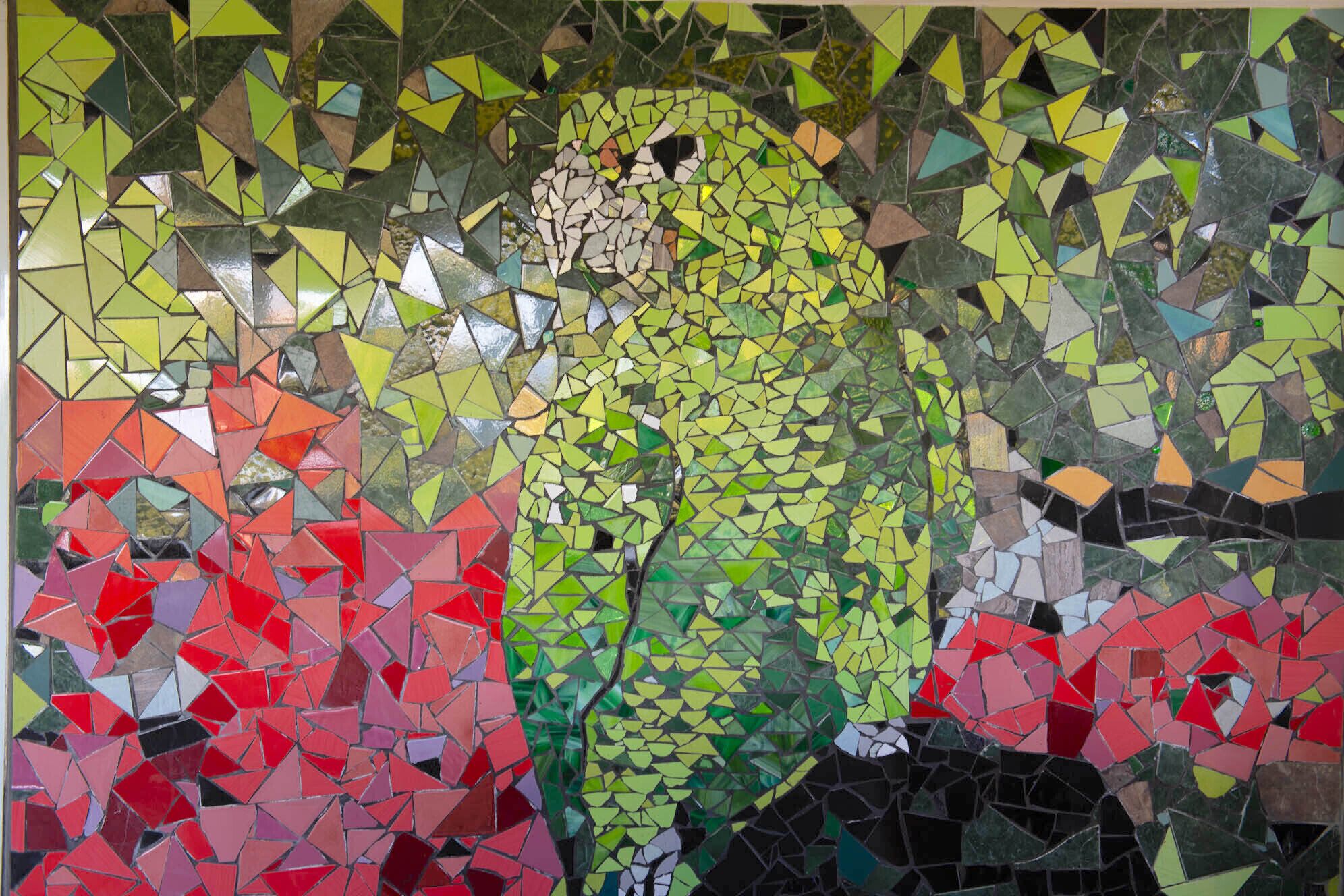 A mosaic artwork with geometric shapes in various colors.