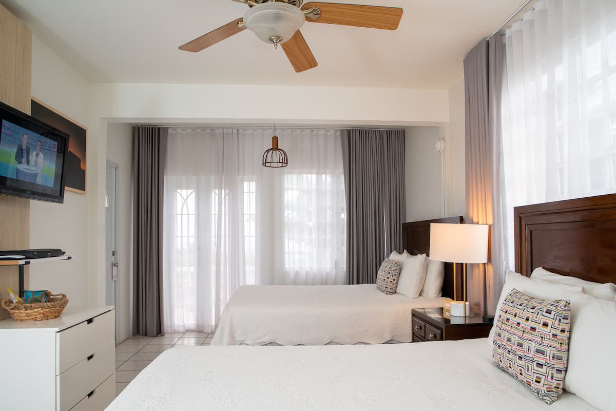 terrace two beds | premium bedding, pillow-top beds, individually decorated