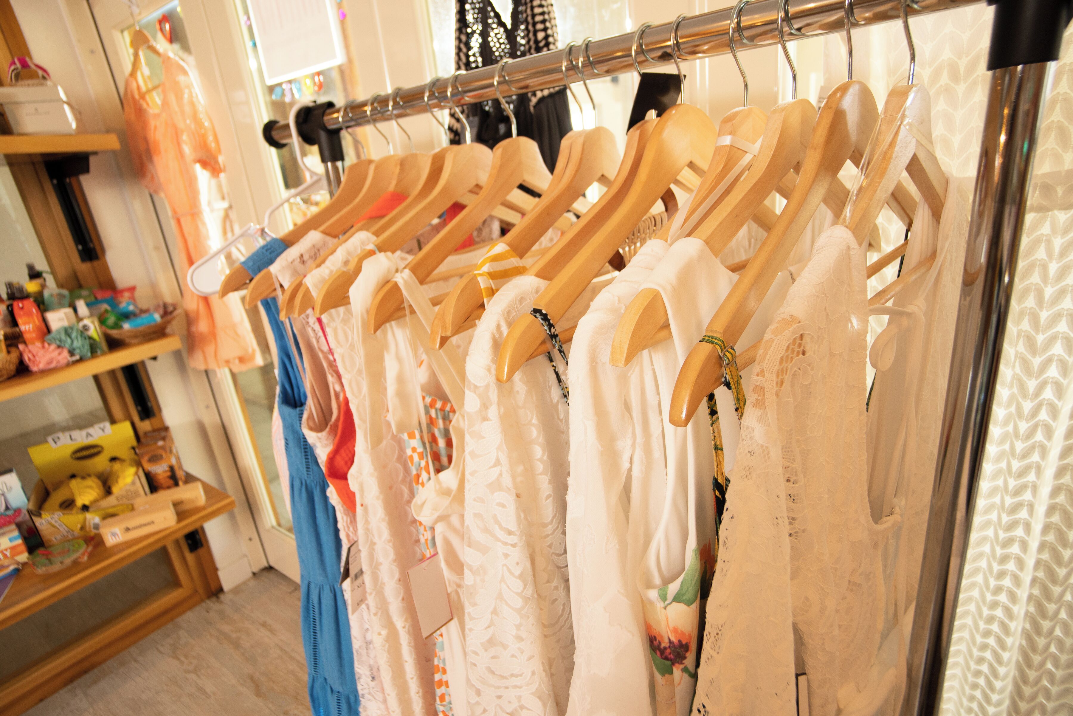 A clothing rack with various garments.