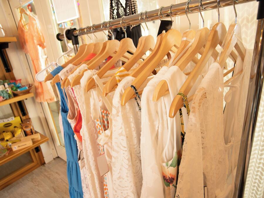 A clothing rack with various garments.
