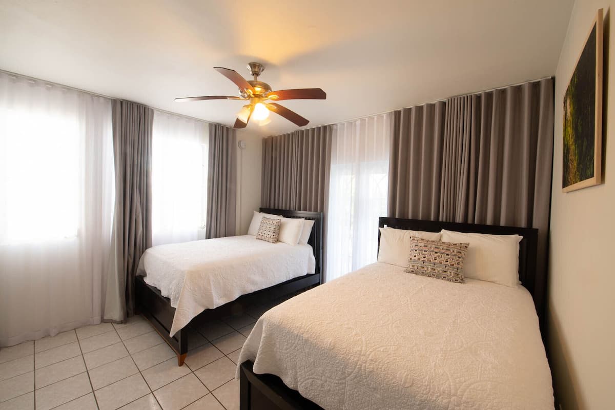 terrace two beds | premium bedding, pillow-top beds, individually decorated