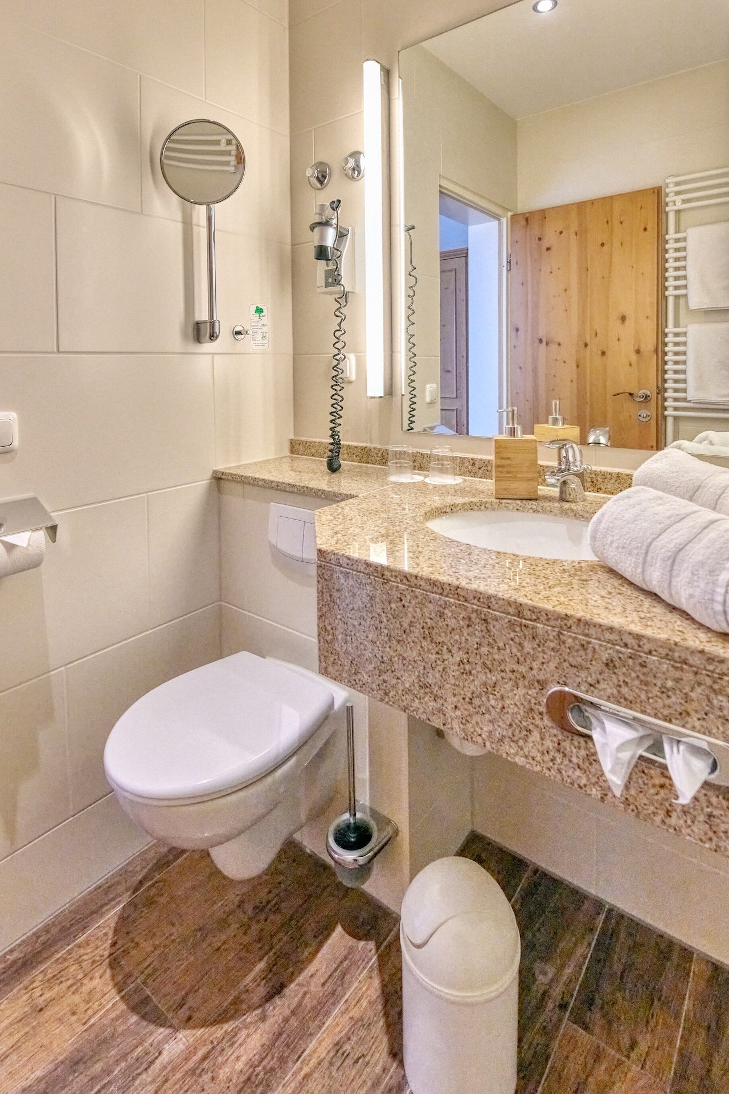 hair dryer, towels, soap, shampoo