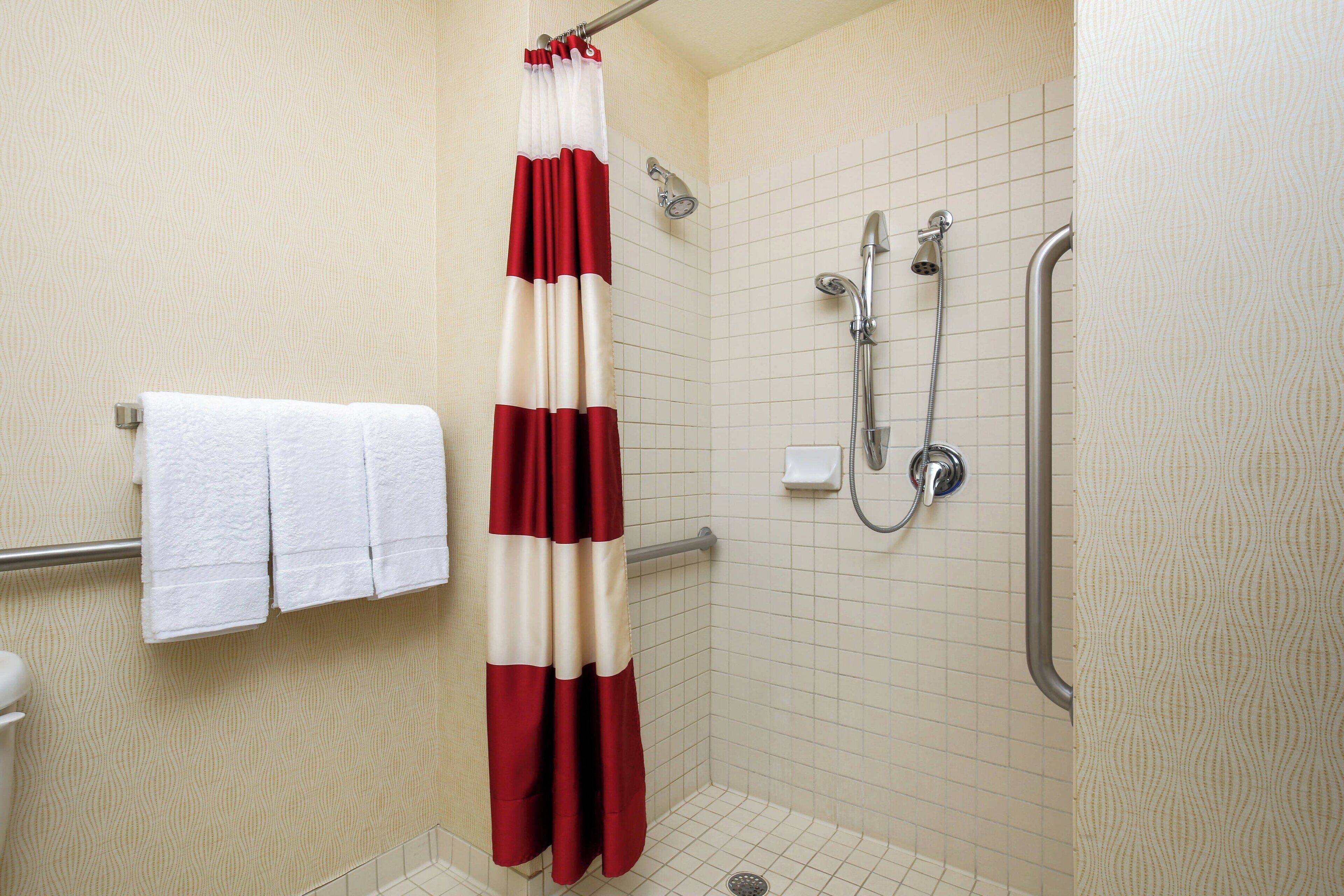 combined shower/bathtub, free toiletries, hair dryer, towels